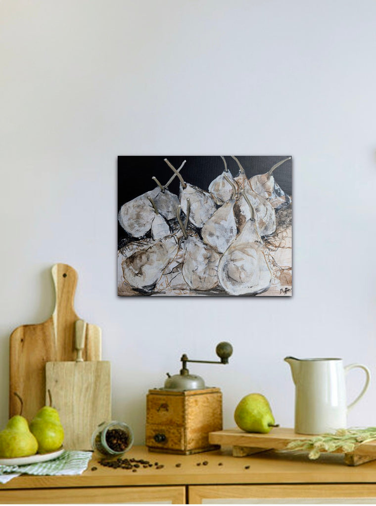 In situ view of original pear still life painting by Myffie Coady displayed in a contemporary kitchen interior